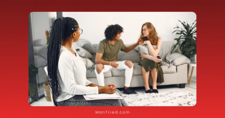 A therapist observes and takes notes while two people sit close together on a couch, talking and comforting each other in a modern, bright room with plants and a rug during CBT for sexual dysfunction.