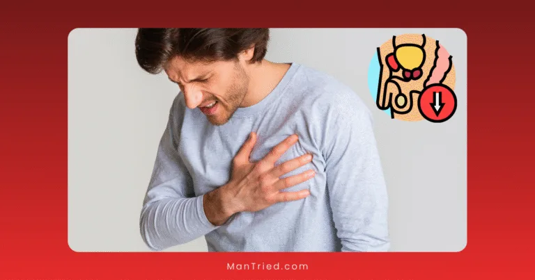 A man in a gray shirt clutches his chest in pain. In the image’s corner, a medical illustration with a downward red arrow hints at male anatomy, suggesting a link between ED and cardiovascular disease.