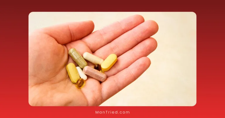 A hand holding several different capsules and tablets, including yellow, brown, and white pills, illustrates supplement stacking against a neutral background.