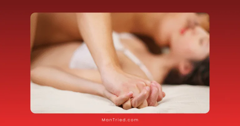 A close-up of a couple lying on a bed, holding hands intimately, with the focus on their intertwined fingers—a tender moment that hints at their desire to last longer together, with blurred faces in the background.