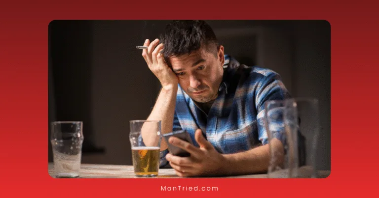 A man in a plaid shirt sits at a table, looking stressed while holding a smartphone in one hand and a cigarette in the other—hinting at substance use and its impact on sexual function. Glasses and a drink sit on the table before him.